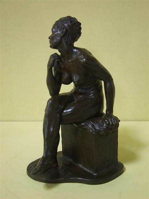 Appraisal: BRONZE FEMALE SEATED NUDE Signed G E KILLIAN she is