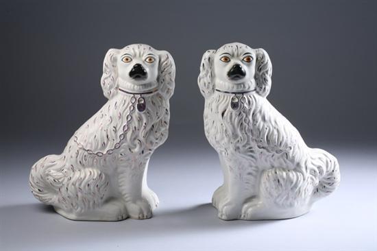 Appraisal: PAIR LARGE STAFFORDSHIRE SPANIELS underside stamped England With lustre details