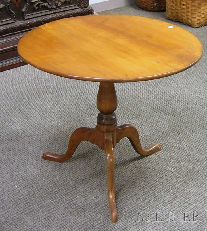 Appraisal: Country Cherry Tilt-top Tea Table ht dia in