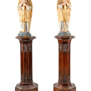 Appraisal: A Pair of Painted and Parcel Gilt Figural Altar Prickets