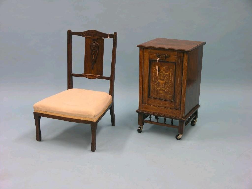 Appraisal: An Edwardian rosewood and marquetry bedside cupboard single door inlaid