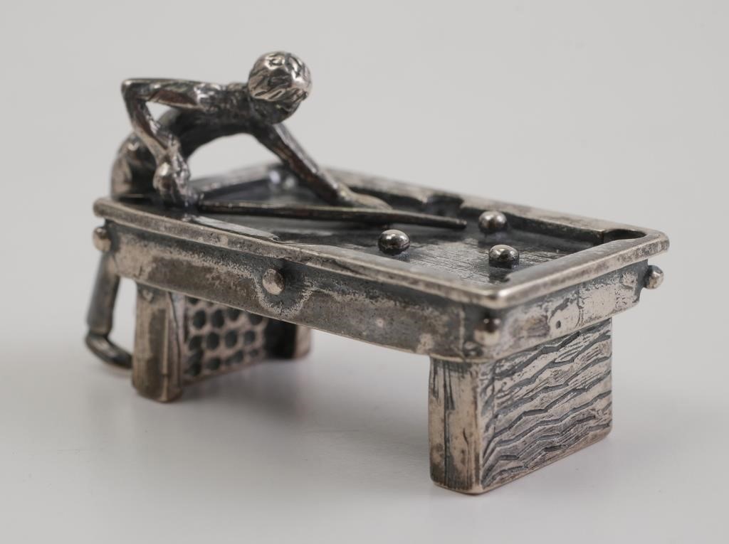 Appraisal: Miniature sterling silver pool table with player taking a shot