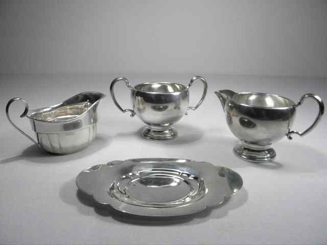 Appraisal: Four pieces of American sterling silver Includes a Hunt Silver