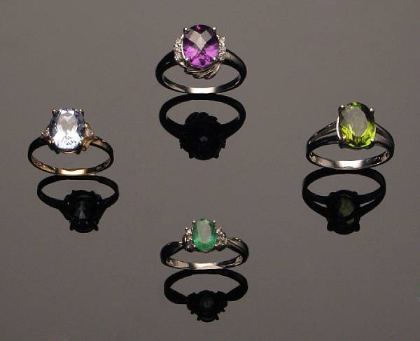 Appraisal: A collection of four gem-set and gold rings featuring gem-set