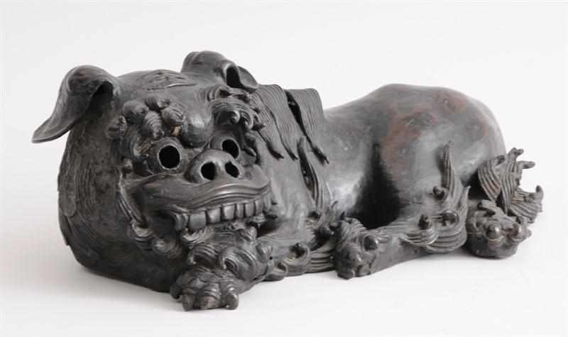 Appraisal: CHINESE BRONZE FIGURE OF A RECUMBENT FU DOG Modeled with