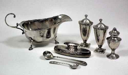 Appraisal: A George V silver sauce boat with shaped rim C-scroll