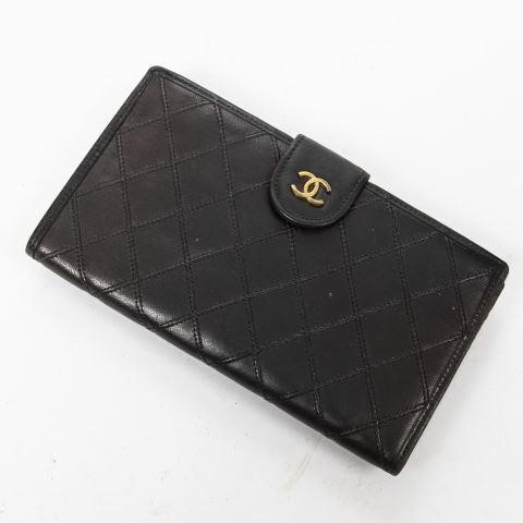 Appraisal: Chanel long clutch wallet in black quilted smooth leather with