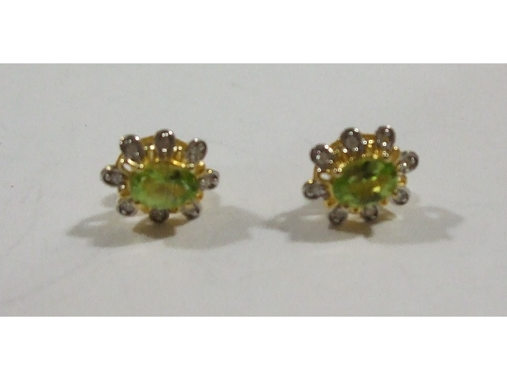 Appraisal: Pair of silver gilt peridot and diamond cluster stud earrings