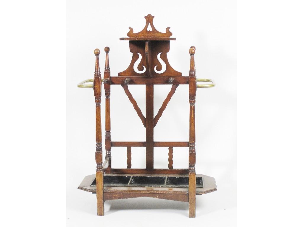 Appraisal: An Arts and Crafts mahogany Hatstand with brass rails turned