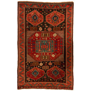 Appraisal: A Caucasian Wool Rug Early th Century feet inches x