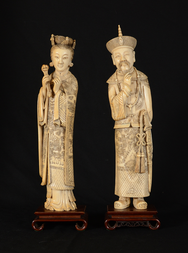 Appraisal: PAIR CARVED IVORY FIGURES EMPEROR AND EMPRESS ON BASES Emperor