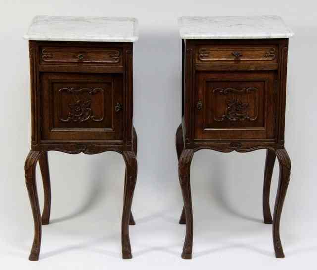 Appraisal: A pair of Louis XV style marble topped bedside tables