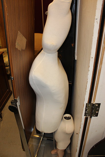 Appraisal: A TORSO MANNEQUIN on stand together with two child size