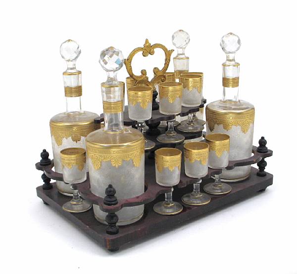 Appraisal: An etched and gilt heightened liquer set and stand lacking