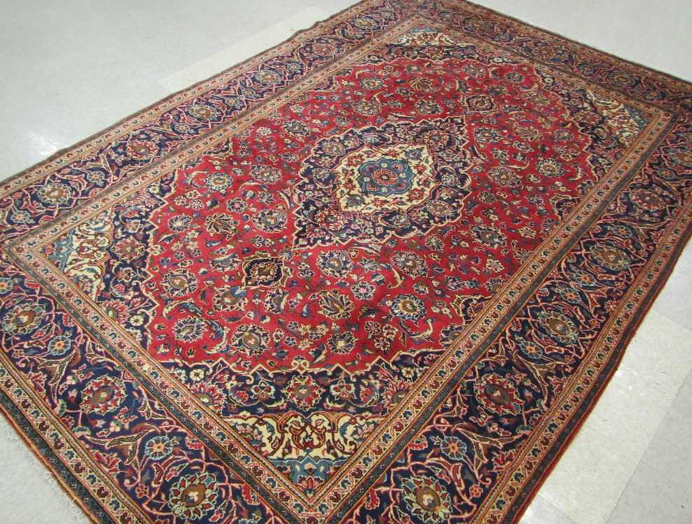 Appraisal: PERSIAN ARDAKAN KASHAN CARPET floral and central floral medallion design