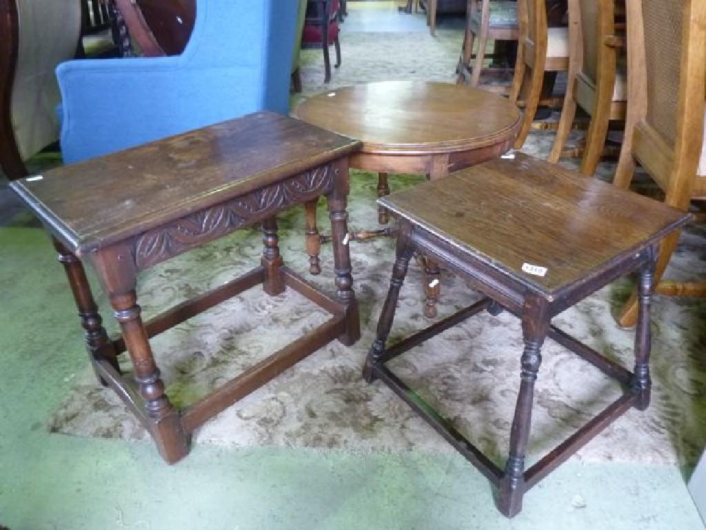 Appraisal: An Old English style oak occasional table with carved detail