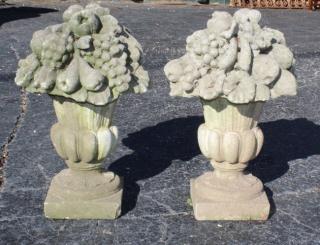 Appraisal: Pair Italian cut Vicenza stone fruited garden urns Pair Italian