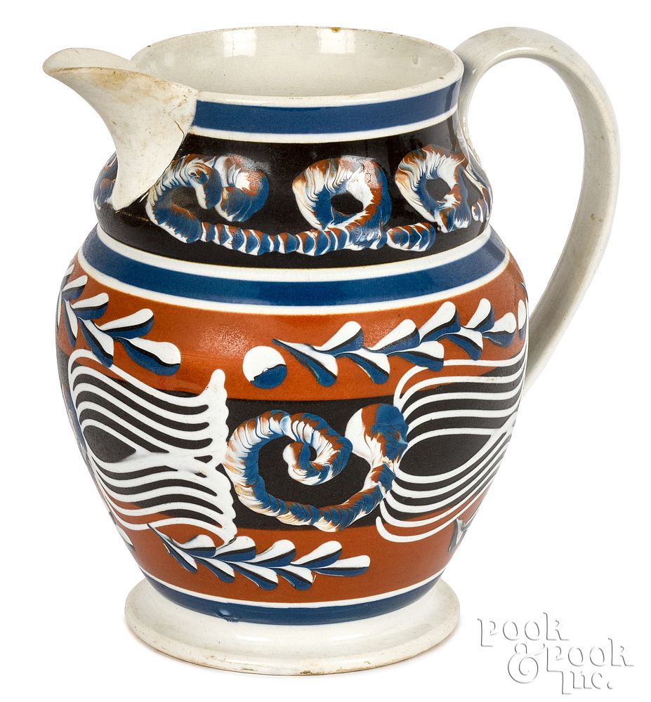 Appraisal: Exceptional mocha pitcher Exceptional mocha pitcher with earthworm twig and