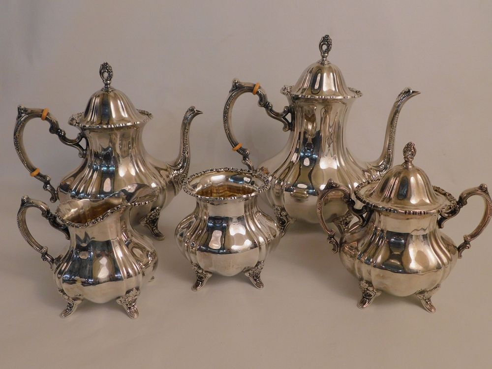 Appraisal: POOLE PC STERLING SILVER TEA SET Five piece sterling silver