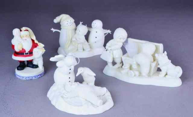 Appraisal: SNOWBABIES - BISQUE PORCELAIN FIGURINESIncluding 'Here Comes Santa Claus '