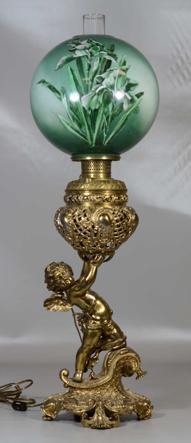 Appraisal: Victorian putti figural base table lamp with green painted lily