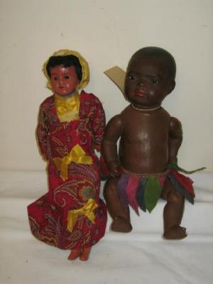 Appraisal: A Heubach bisque head negro baby doll with brown glass