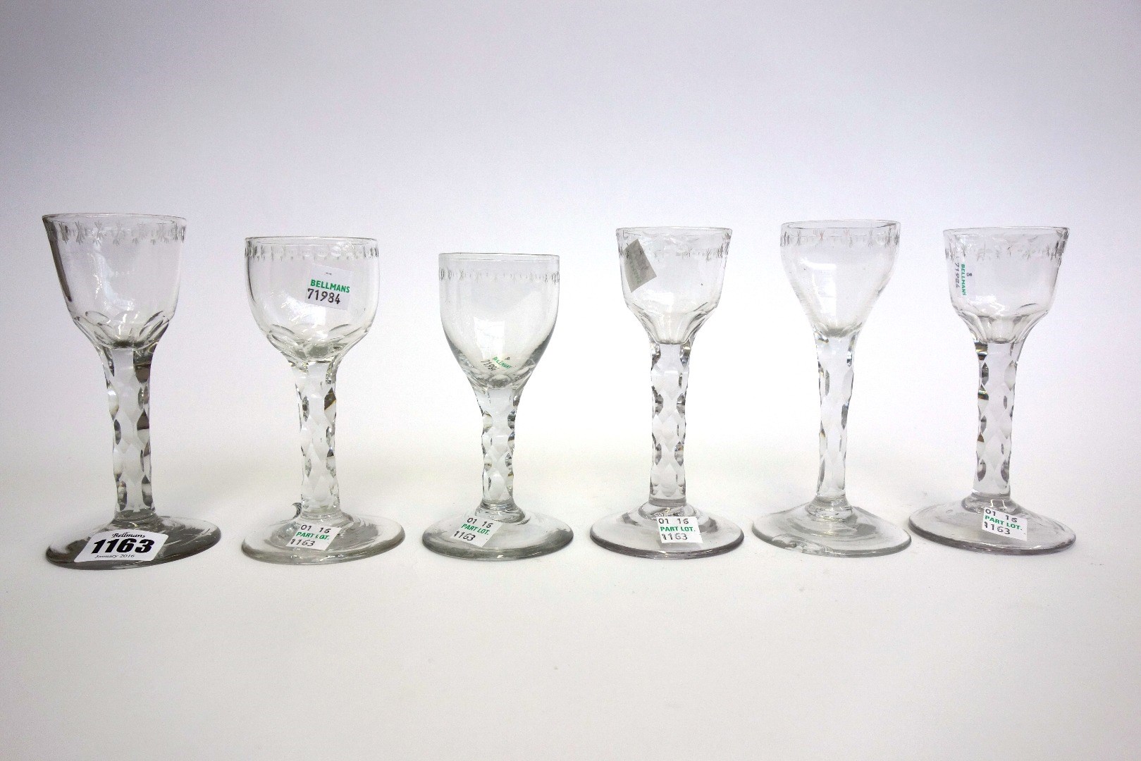 Appraisal: Six similar English engraved wine glasses circa each with a