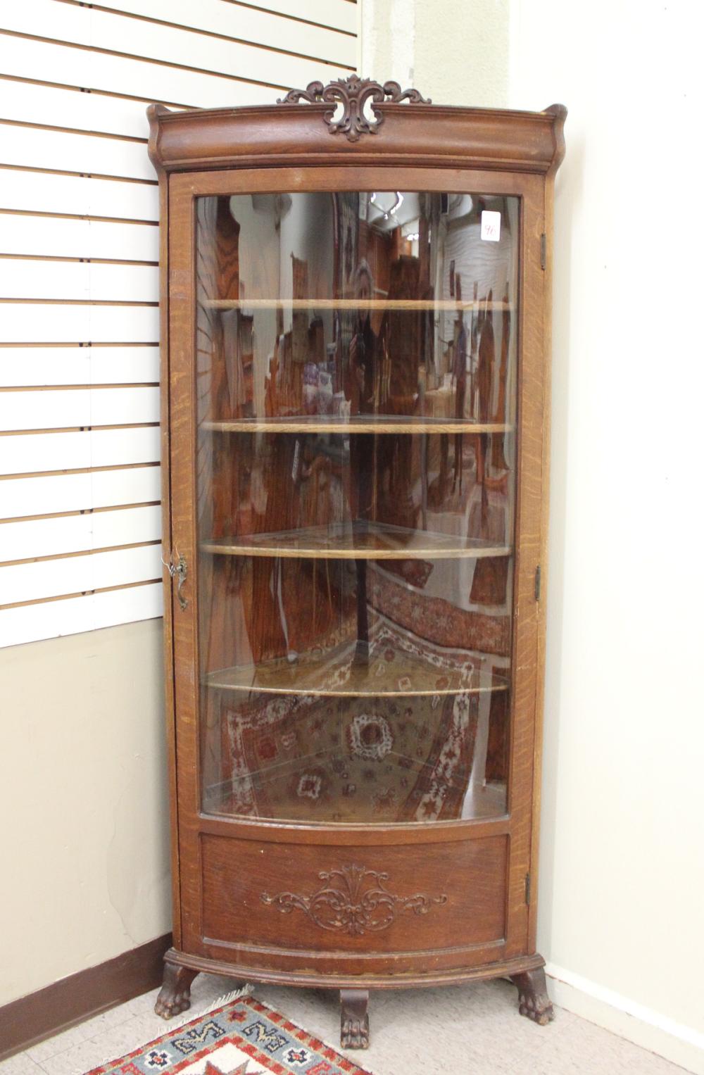 Appraisal: LATE VICTORIAN OAK AND CURVED GLASS CORNER CABINET American c