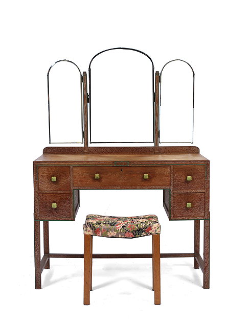 Appraisal: AN ART DECO LIMED OAK DRESSING TABLE with a triple