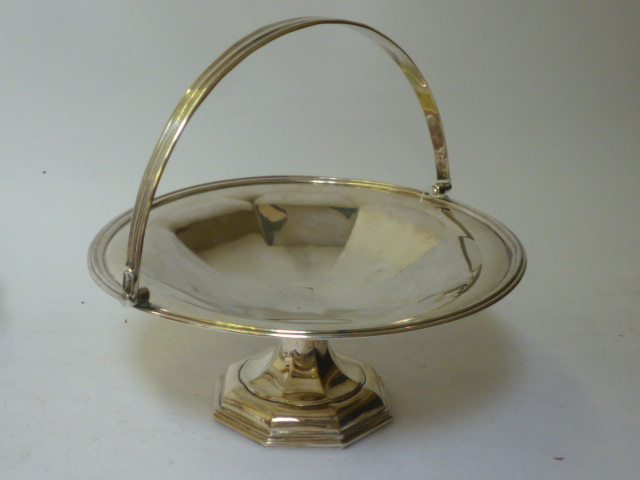 Appraisal: A CAKE BASKET maker Walker Hall Sheffield of plain circular