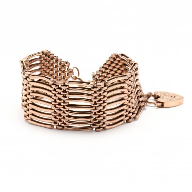 Appraisal: Vintage Rose Gold Gate Link Bracelet with Gold Padlock Charm