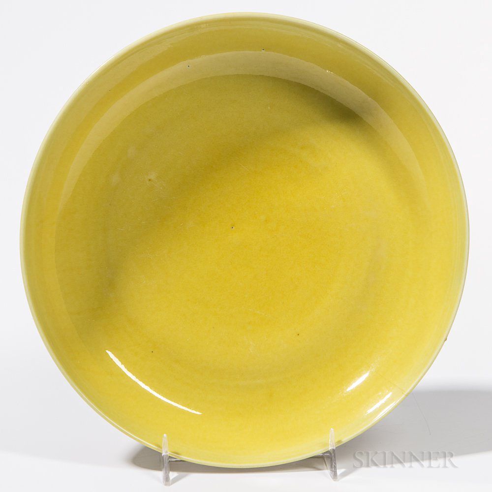 Appraisal: Yellow-glazed Dish Yellow-glazed Dish China Ming dynasty the shallow rounded