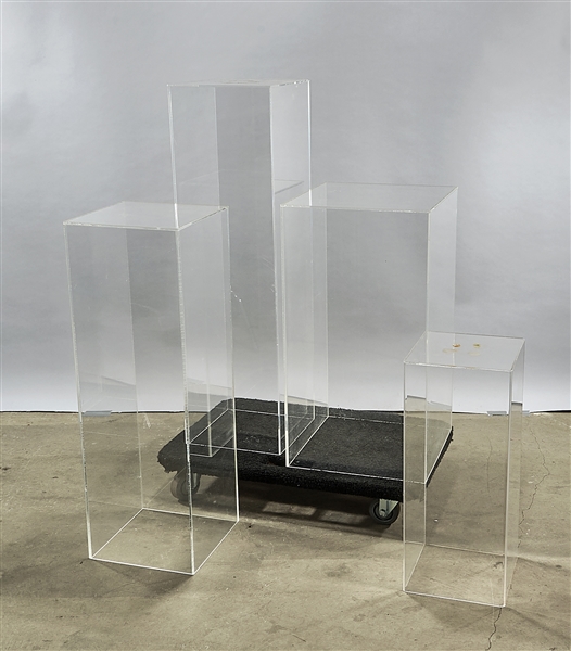 Appraisal: Four plexi-glass pedestals x sq tallest approx Condition used as-is