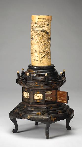 Appraisal: A carved ivory tusk on tall footed stand Meiji Period