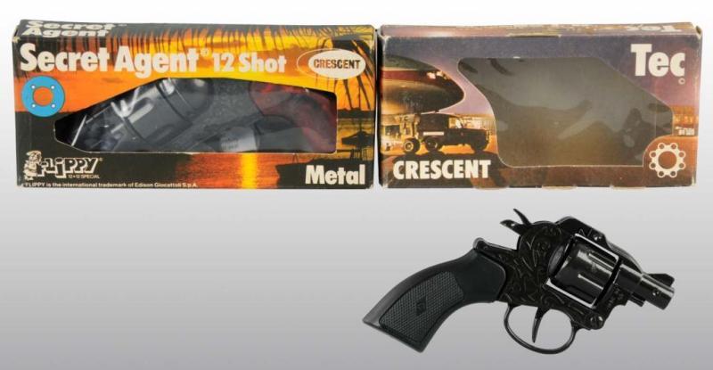 Appraisal: Lot of Crescent Toy Cap Guns Description With original boxes