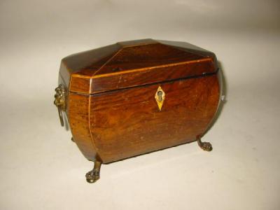 Appraisal: A REGENCY ROSEWOOD TEA CADDY of sarcophagus form with box