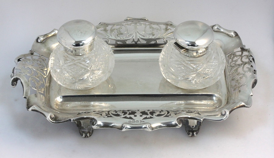 Appraisal: A partners' silver inkstand and pen tray Walker Hall Sheffield