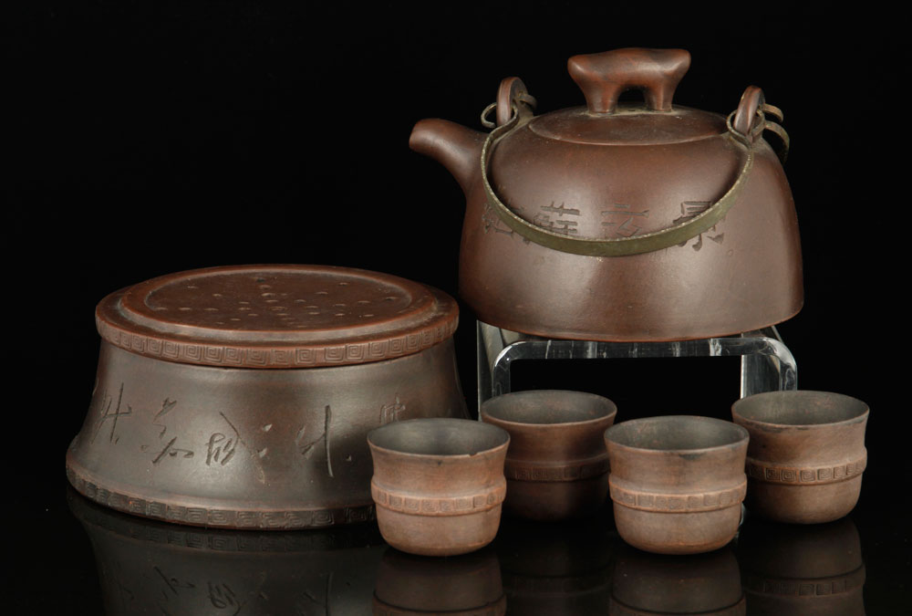 Appraisal: - Yixing Tea Set Yixing tea set China stoneware carved