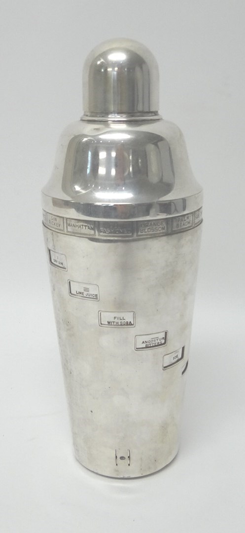 Appraisal: A plated cocktail shaker the body rotating to show the