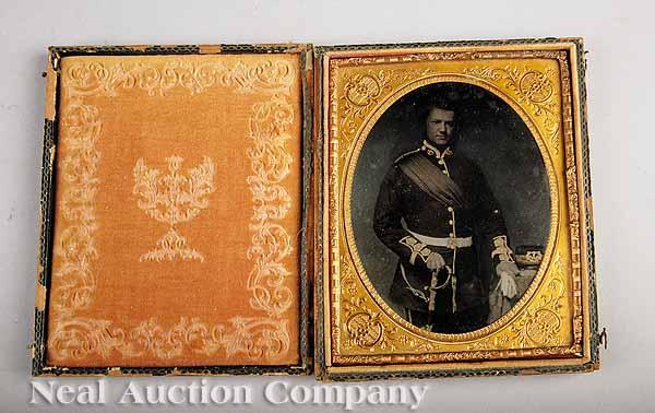 Appraisal: CASED IMAGE an amber glass ambrotype with gold highlights of