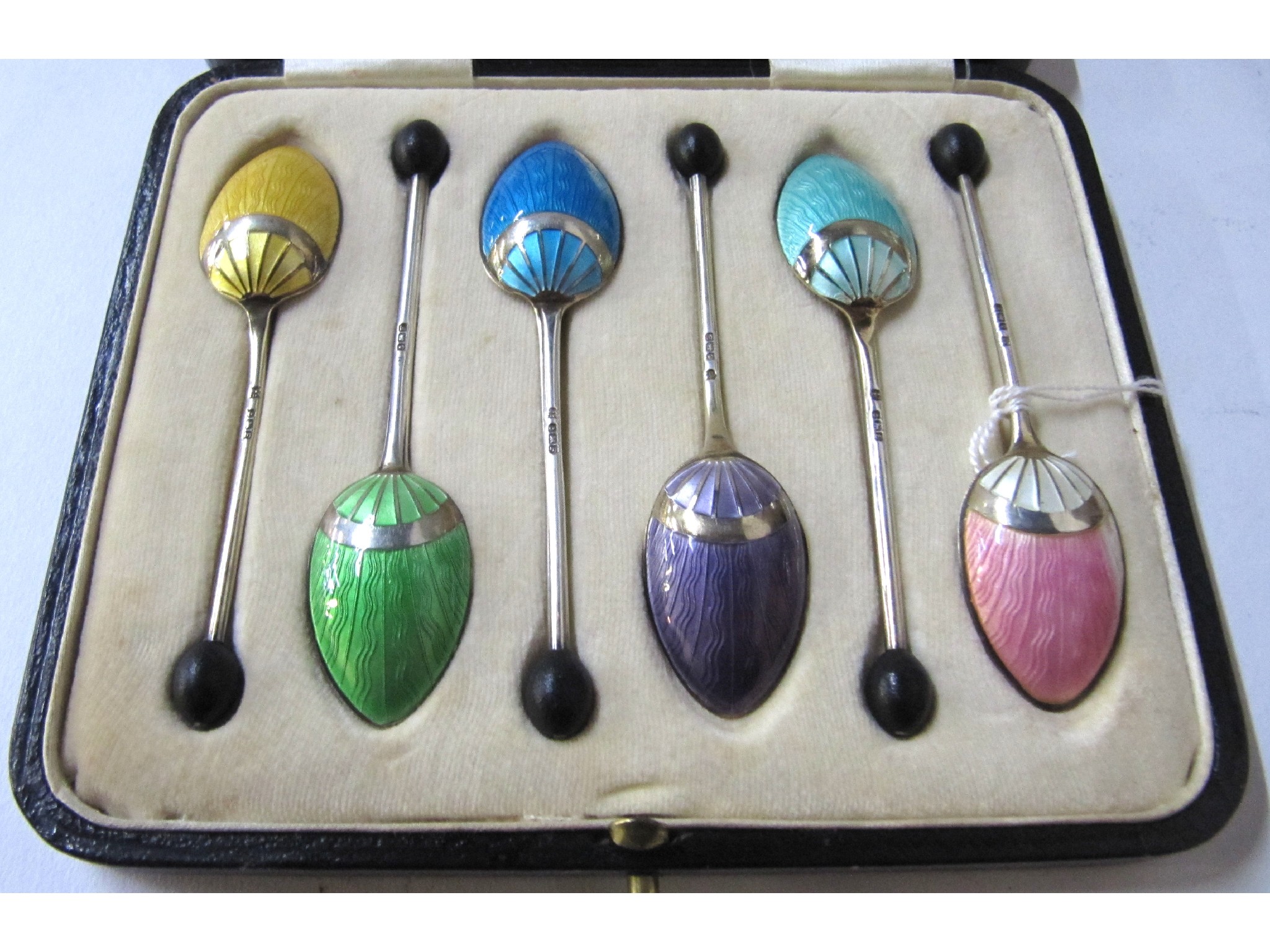 Appraisal: A cased set of six silver and enamel coffee bean