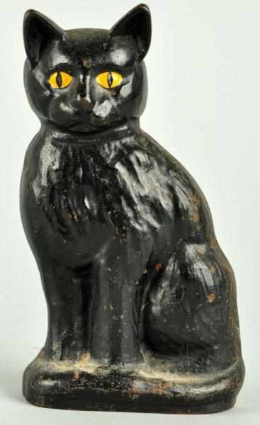 Appraisal: Cast Iron Sitting Cat Wedge Doorstop Description Made by Spencer