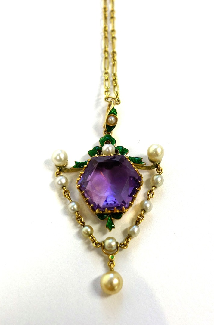 Appraisal: A gold amethyst and cultured pearl set and green enamelled