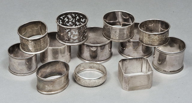 Appraisal: A COLLECTION OF TWELVE VARYING SILVER NAPKIN RINGS varying dates