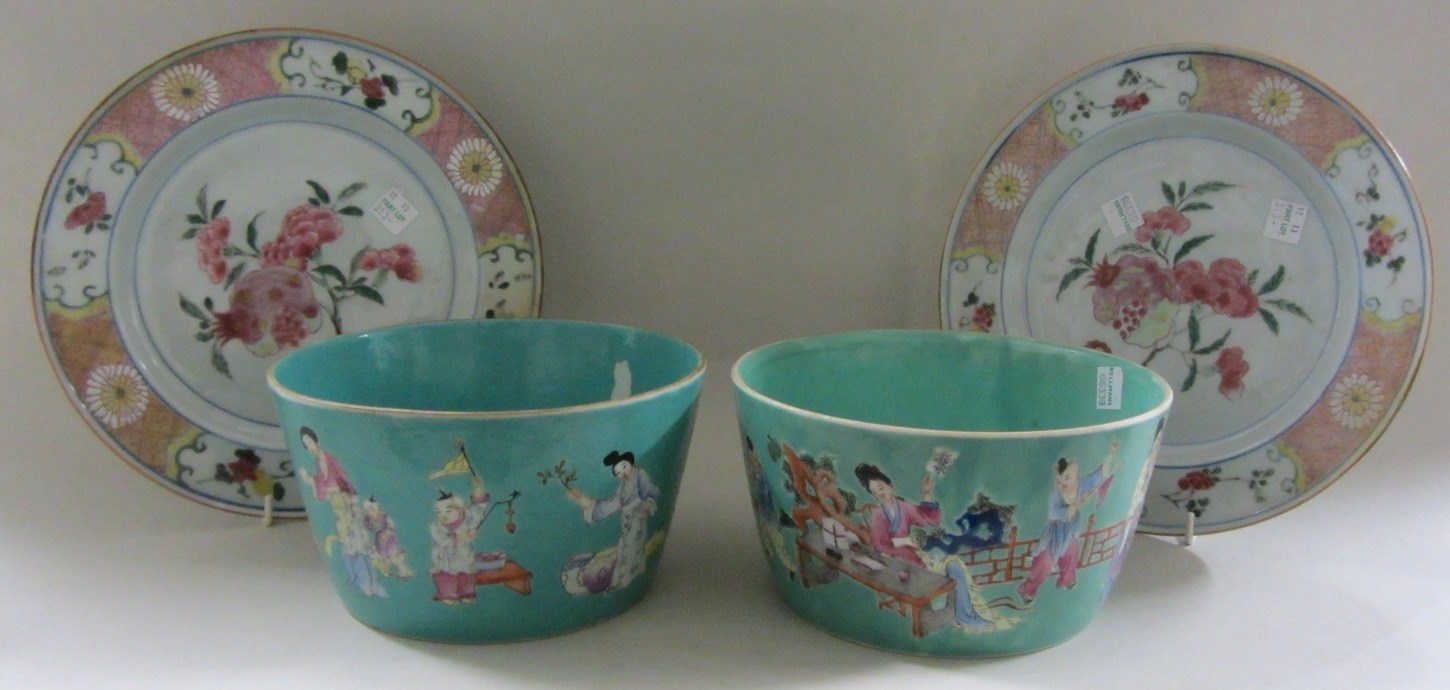 Appraisal: A pair of Chinese porcelain green-ground famille rose bowls Jiaqing