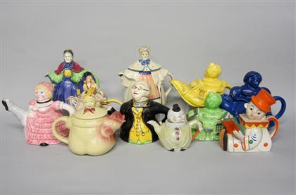 Appraisal: Collection of figural ceramic teapotsComprising clowns an older lady a