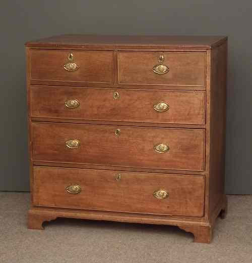 Appraisal: A George III oak chest of drawers the top with