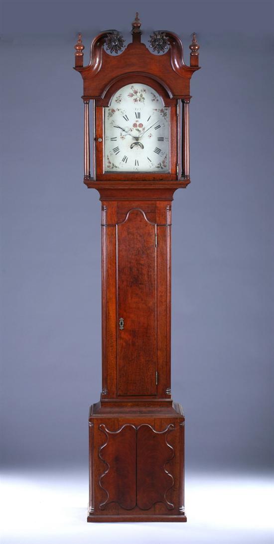 Appraisal: PENNSYLVANIA WALNUT TALL-CASE CLOCK early th century In the Chippendale-Federal