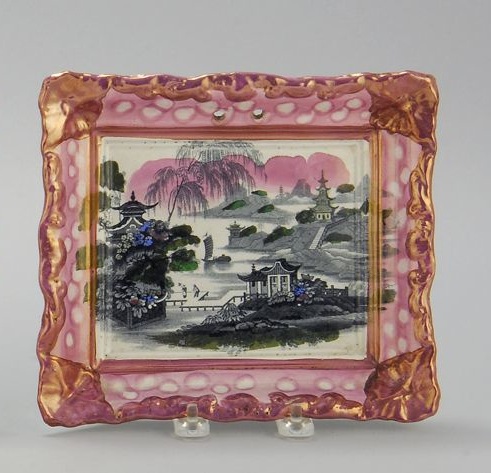 Appraisal: SUNDERLAND PINK LUSTRE PLAQUE Circa With Oriental river landscape with