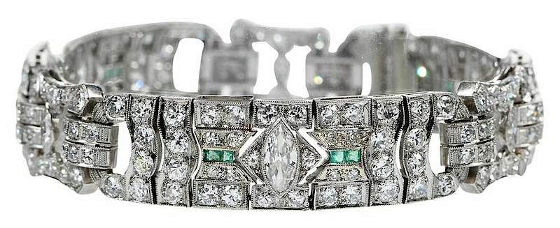 Appraisal: Art Deco Platinum Diamond and Emerald Bracelet approx marquise old